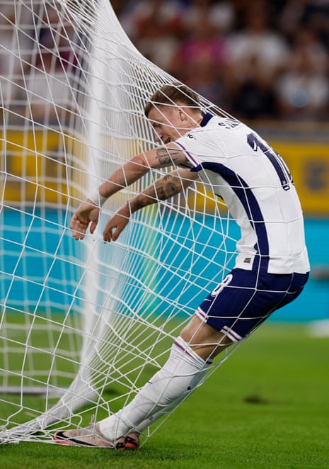 England's Jay Stansfield reacts as he leans against the back of the net having failed to connect to a cross.