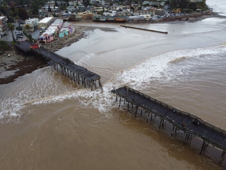 A wharf in Capitola was broken when powerful storm systems slammed California.