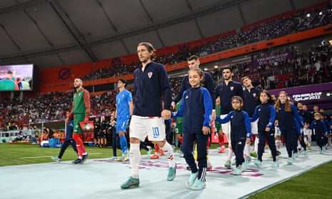 Luka Modric of Croatia leads his team out prior to the FIFA World Cup Qatar 2022 3rd place match between Croatia and Morocco.