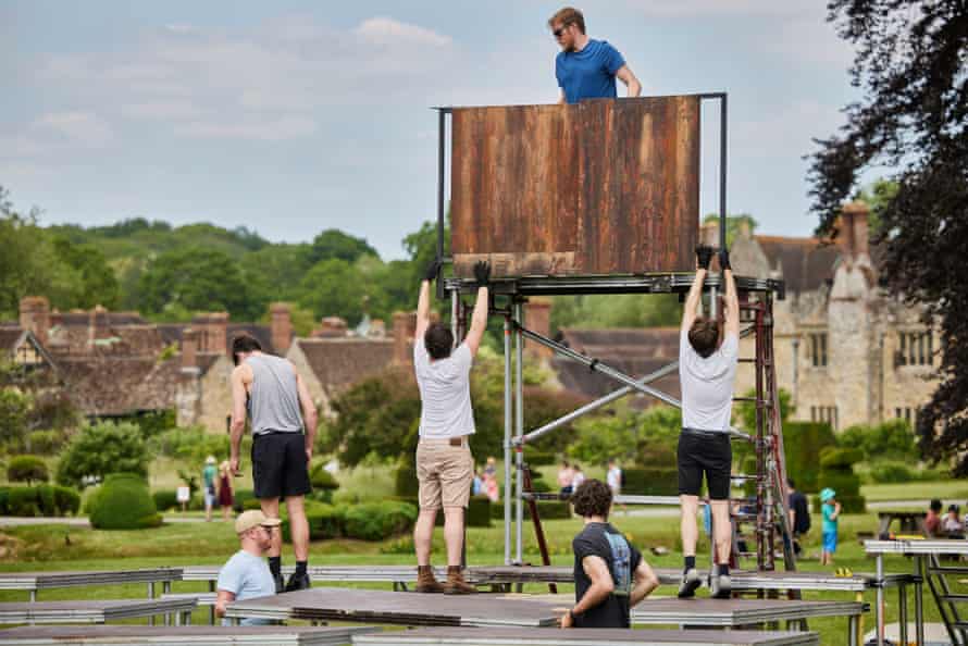 Setting up stage at Hever Castle in Kent, the childhood home of Anne Boleyn. Once trained the actors are virtually self-sufficient for the entire tour, able to transport themselves to venues, set-up stage, perform to audience and strike set. Production Manager Aaron Barker travels along with the company to assist the daily processes.