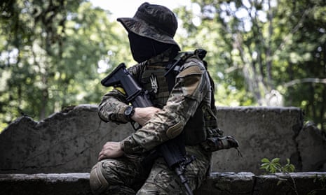 A member of Ukrainian special operations team seen at a woodland in Kharkiv, Ukraine on June 13, 2022.