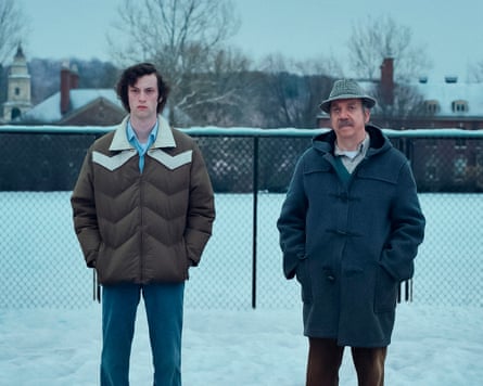 Dominic Sessa, left, and Paul Giamatti in The Holdovers.
