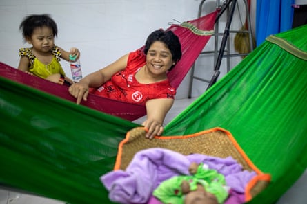 Xuan with her grandchildren at home in Ho Chi Minh City, Vietnam.