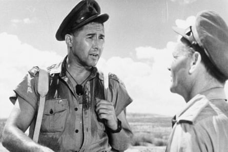 John Mills, left, in Ice Cold in Alex.