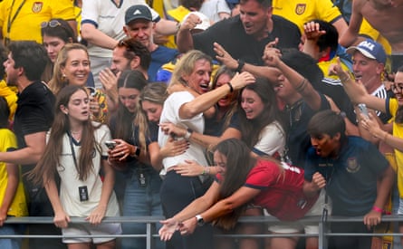 Sebastián Beccacece celebrates with fans and his family after Ecuador’s victory over Germany
