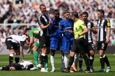 Chelsea’s Nicolas Jackson and Cole Palmer talk to the referee John Brooks just before Jackson is shown a red card.