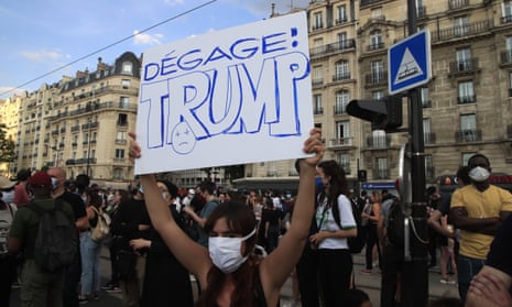 A poster reading ‘Trump go away’ at an anti-racism protest in in Paris in June