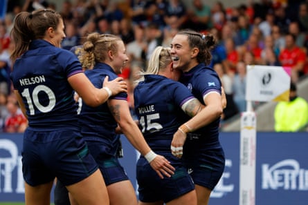 Francesca McGhie celebrates pinch teammates aft scoring Scotland’s 2nd try.