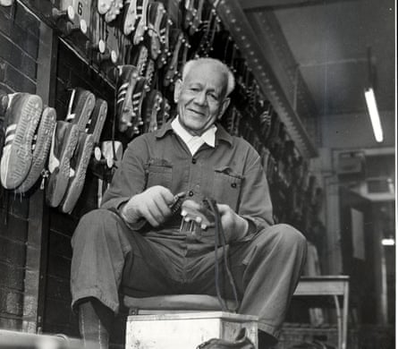 Jack Leslie cleaning football boots.