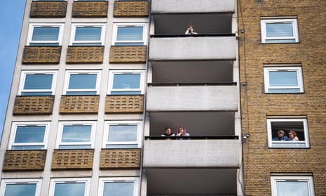 Questions of distance ... people look our their balconies in central London.