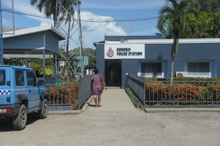 A woman outside a PNG police station