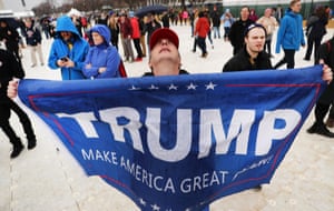 Trump supporters react on the National Mall to his inauguration