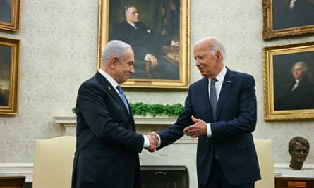 US President Joe Biden shakes hands with Israeli prime minister Benjamin Netanyahu in the Oval Office on 25 July.