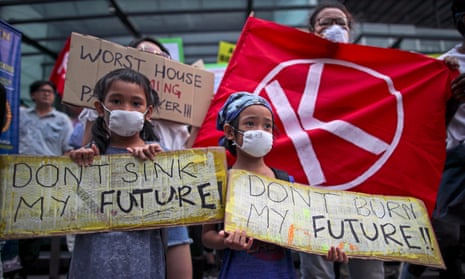Children hold placards during a rally as part of the international Global Climate Strike in Kuala Lumpur, Malaysia.