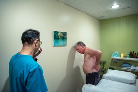 John Curry receives acupuncture and cupping treatments by Dr Jeng Kuan in Matawan, New Jersey, April 2023