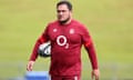 Jamie George carries the ball under his arm in training