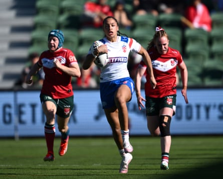 Amelia Brown wonâÂÂt be caught as she surges towards the try line to touch down for England against Wales