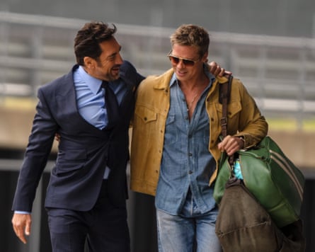Javier Bardem as Ruben Cervantes and Brad Pitt as Sonny Hayes in F1 the Movie.