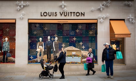 Shoppers outside Louis Vuitton on New Bond Street.