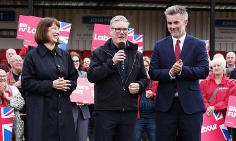 Labour Party leader Keir Starmer (centre) and shadow chancellor Rachel Reeves, celebrate with David Skaith at Northallerton Town Football Club, North Yorkshire.