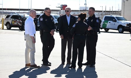 President Joe Biden speaks with border protection police on the Bridge of the Americas border crossing between Mexico and the US in Texas this January.