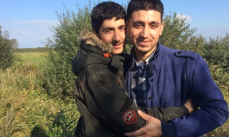 ‘This is no place for a child’ … Jamshid, left, and his 20-year-old cousin Amruddin Jan, reunited in the Calais camp.