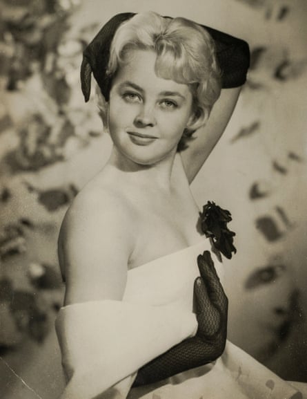 Vicki Goodwin in an archive image wearing a glamorous dress and black gloves
