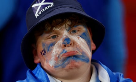 A dejected Scotland fan.