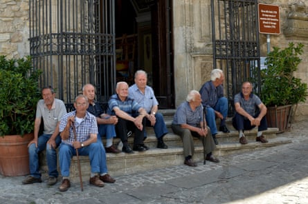 Men outside the church in the centre of Gangi, a depopulated town about 75 miles from Palermo with a €1 house programme.