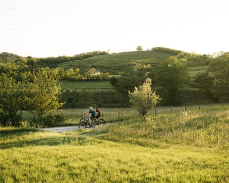 Three cyclists on a Vipava valley E-bike tour, in Slovenia.