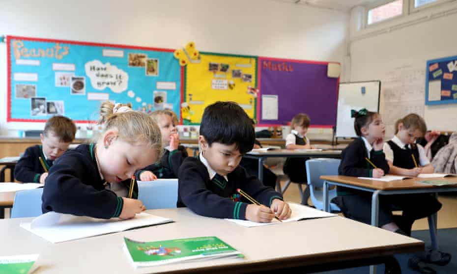 Pupils at Manor Park school and nursery in Knutsford, Cheshire, take part in a phonics lesson.