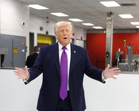 Donald Trump speaking with his arms out wide