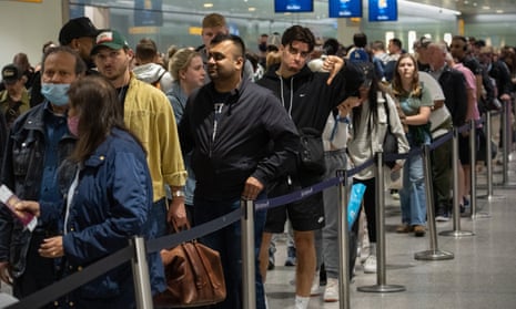 Passengers queueing at Heathrow airport near London, 1 June 2022