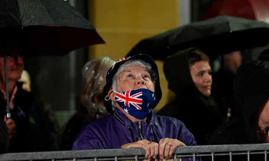 A member of the public attends the Dawn Service ceremony commemorating Anzac Day in Sydney, Australia, April 25, 2022