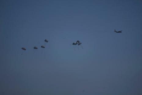 An aircraft airdrops humanitarian aid over northern Gaza Strip on 28 July 2025.