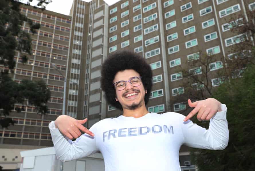 Resident Ali Abdalla poses for a photo outside the Albert Street public housing tower in North Melbourne,.