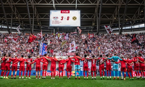 Leipzig players celebrate in front of their fans after the 3-0 win.