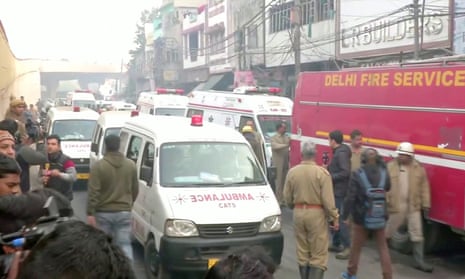 Ambulances in Delhi after a deadly fire