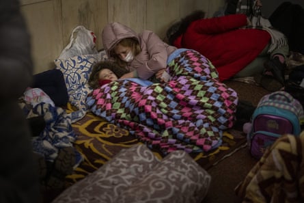 People rest in the Kyiv subway, using it as a bomb shelter, 24 February