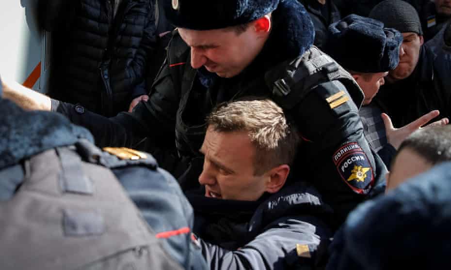 Alexei Navalny is arrested at a rally in Moscow on Sunday.