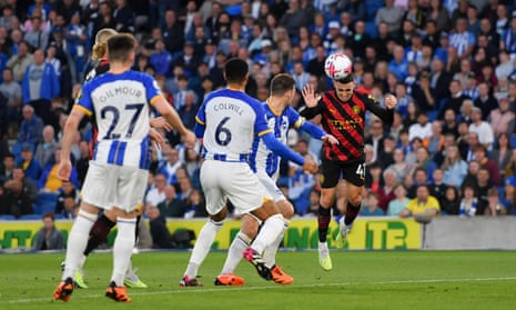 Manchester City's Phil Foden heads wide at Brighton.