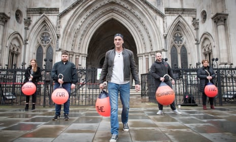Two members of the Freshwater Five, Daniel Payne, centre, and Scott Birtwistle, second right, outside the Royal Courts of Justice last month.