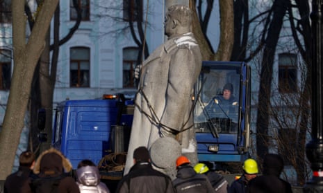 Municipal workers dismount a monument to second world war army general Nikolai Vatutin in Kyiv.