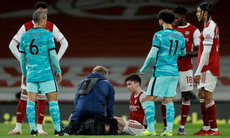 Kieran Tierney receives treatment during Arsenal’s defeat by Liverpool last Saturday.
