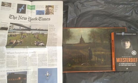 A photo of a painting believed to be Van Gogh’s stolen work and a copy of the New York Times