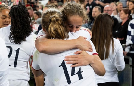 England’s Abby Dow and Lydia Thompson embrace after the final whistle