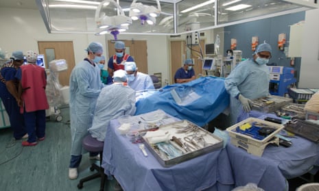 NHS staff in an operating theatre