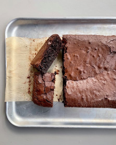 A close-up of a batch of brownies in a baking tray.