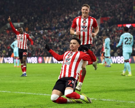 Sunderland's Chemsdine Talbi celebrates scoring their third goal with Daniel Ballard.