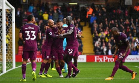 The Manchester City players celebrate Sergio Agüero’s second goal during their 6-0 thrashing of Watford. 